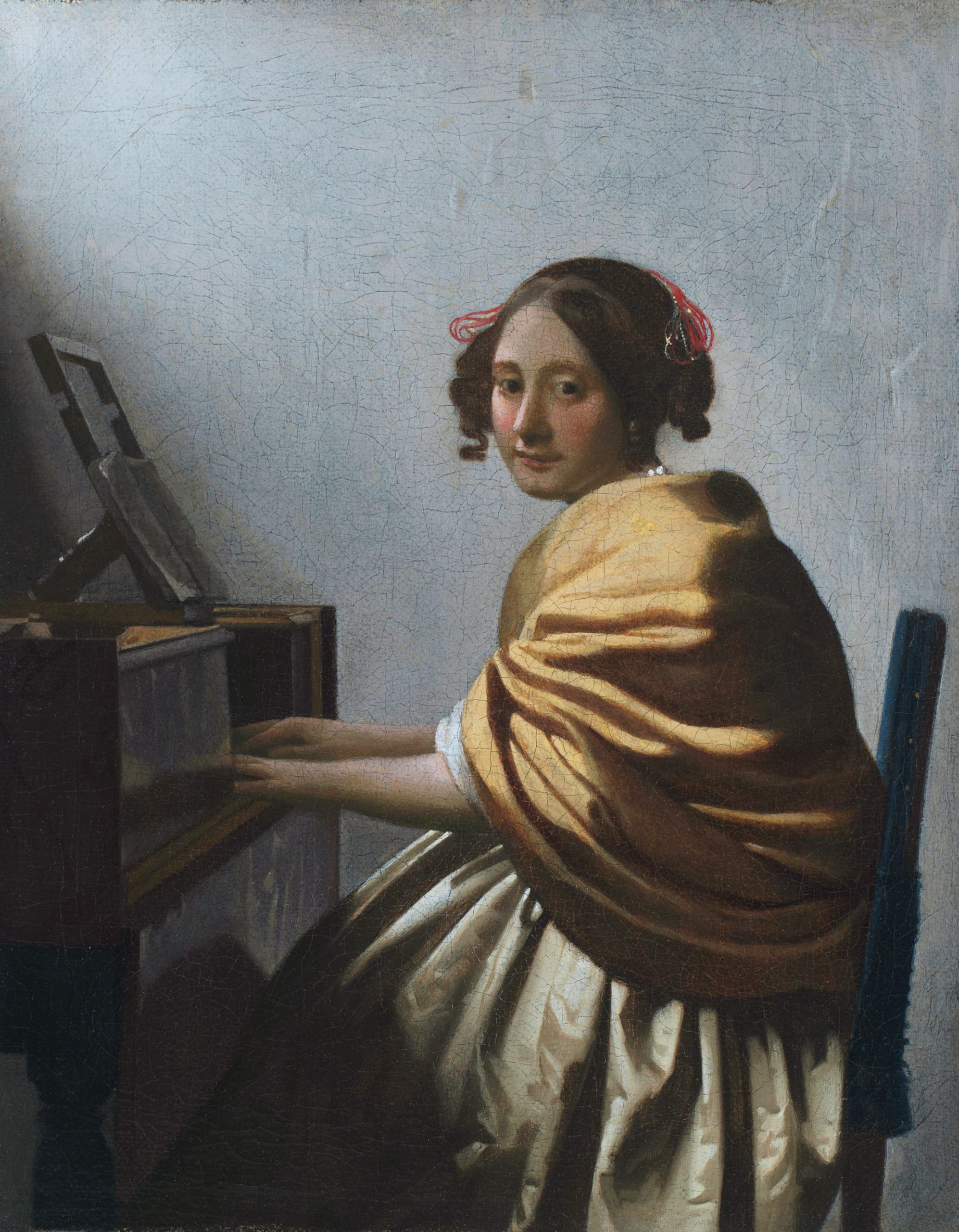 A Young Woman Seated at the Virginal 